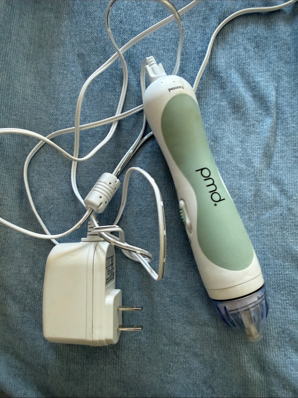 PMD Handheld Exfoliation Device in Green and White with Adapter